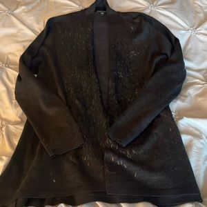 Eileen Fischer black hip length sweater with front design feature